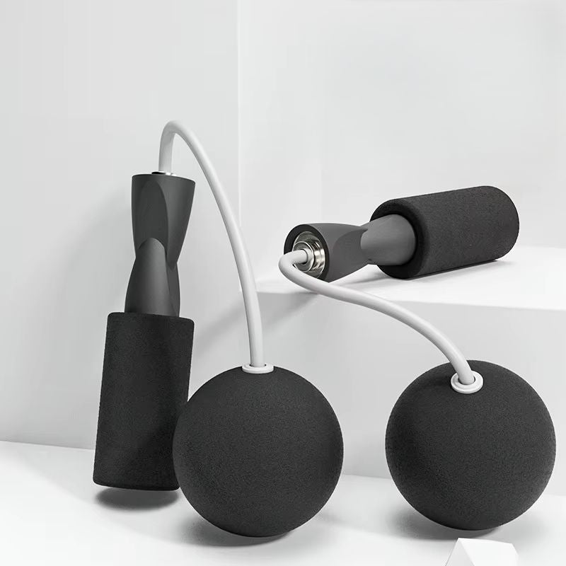 corde-a-sauter-sans-corde-noire-poignee-mousse-avec-balles