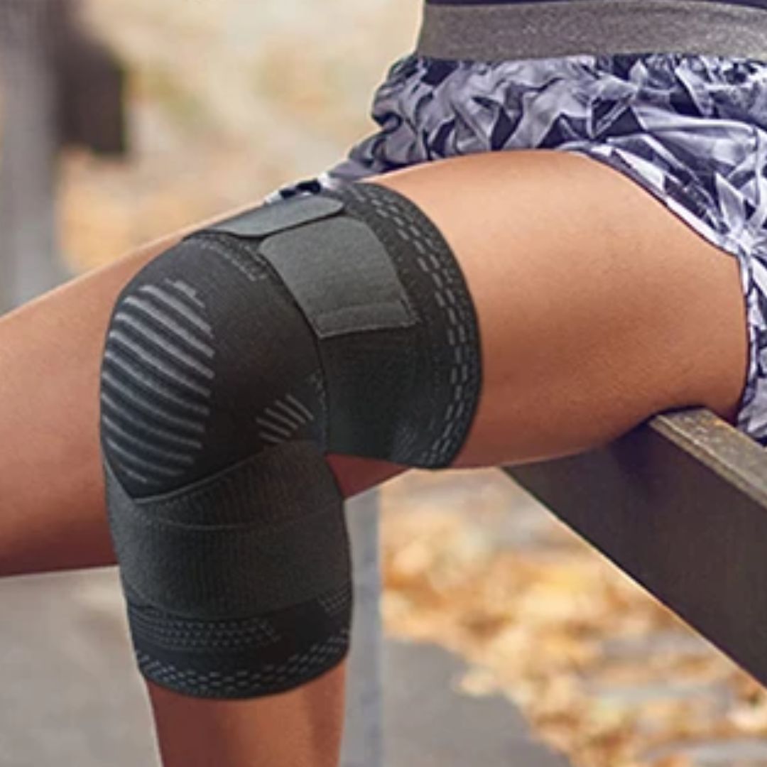 genouillere sur genou gauche femme assise barriere
