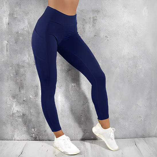 legging sport femme bleu sur pointe pied gauche