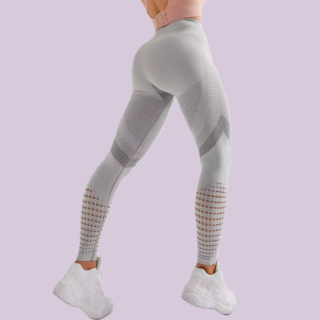 legging sport femme de dos jambe decalee en arriere