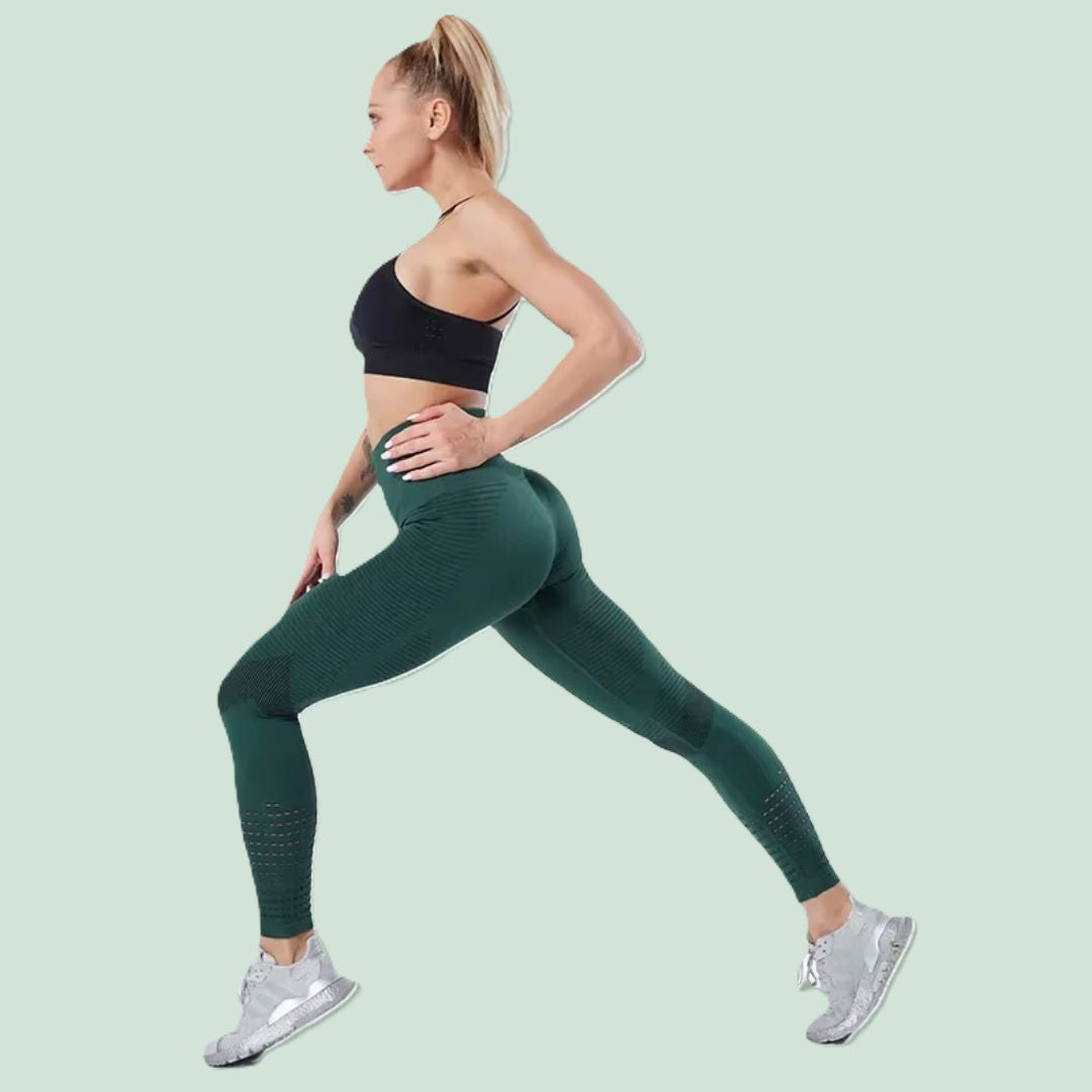 legging sport femme main gauche sur hanche gauche