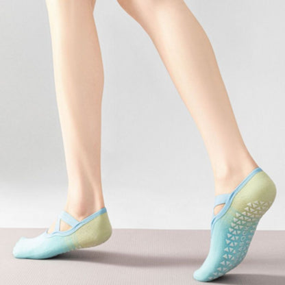 chaussette-antiderapante-bleu-vert-femme-jambes-nues