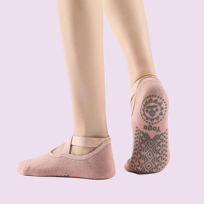 chaussettes-antiderapantes-roses-femme-pied-droit-leve