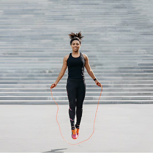 corde-a-sauter-crossfit-femme-devant-escalier