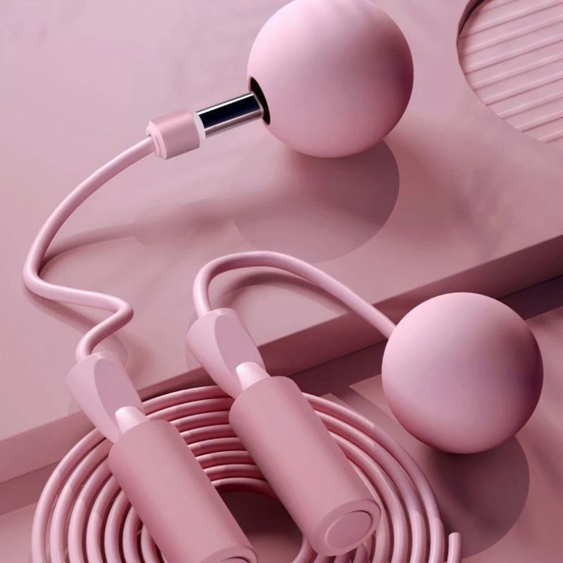 corde-a-sauter-sans-corde-avec-grosses-boules-roses