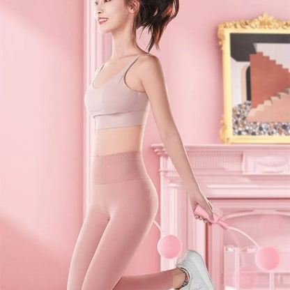 corde_a_sauter_sans_corde_rose_femme_salon