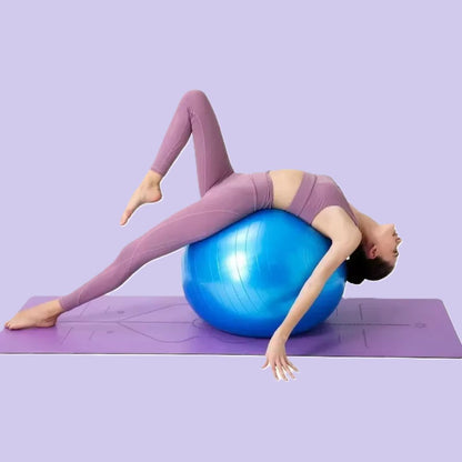 femme alongée sur dos sur swiss ball bleu jambe et bras gauches tendus