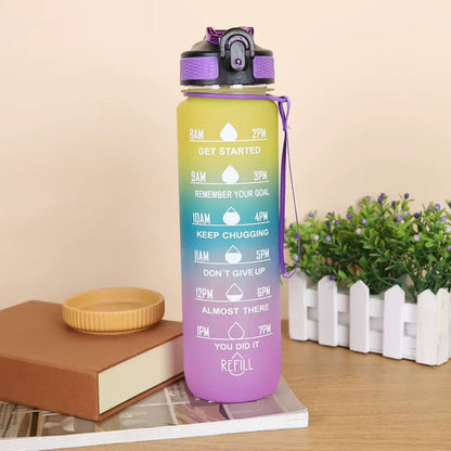 gourde 1 litre posee sur livre bureau