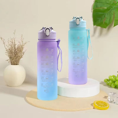 gourde sport debout table cote citron raisin