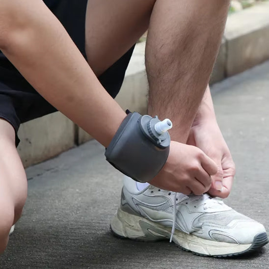 gourde sport poignet droit homme fait lacet basket