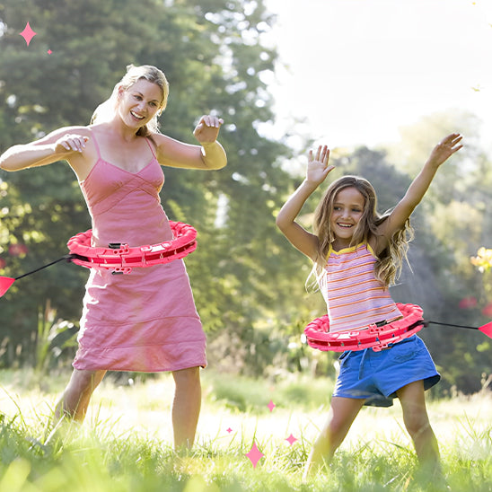 hula-hoop-lest-rose-femme-et-petite-fille